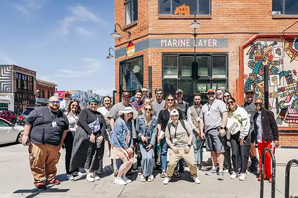 Anywhere-54-600×400-1 Corporate event - the group sits at a banquet table for dinner next to a dance floor