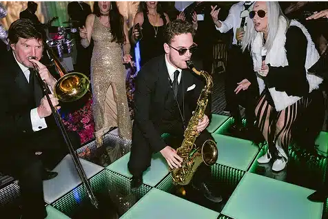 A jazz band plays at a party