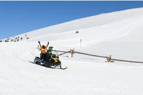 riding snow blowers at a corporate event