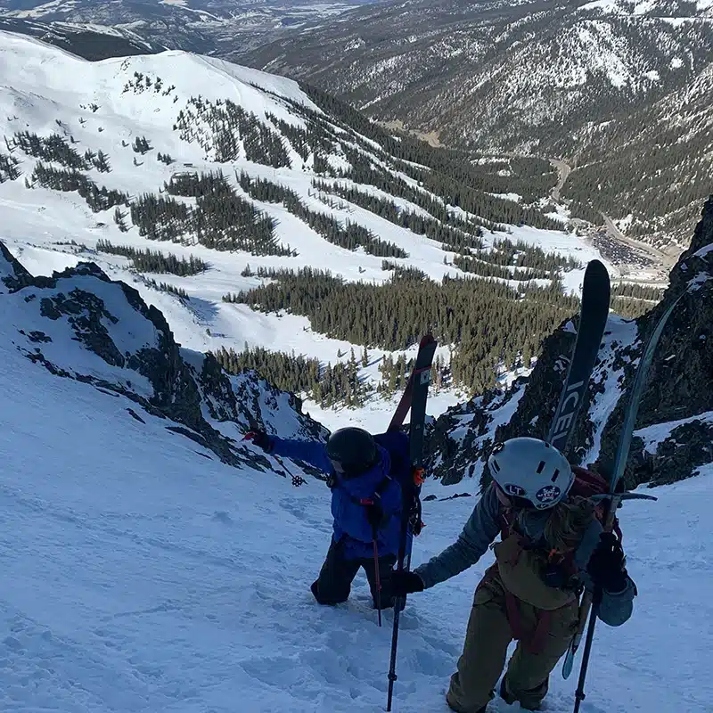 Aspen (3)skiing 2 people hike while skiing in the back country